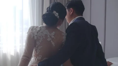 Fiancee Leaning Her Head on Groom to Be Shoulder Indoor Stock Footage 334027455
