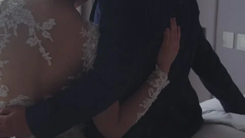 Fiancee Leaning Her Head on Groom to Be Shoulder Indoor Stock Footage 334027706