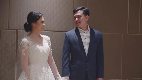 Fiancee Looking Lovingly at Her Groom to Be Stock Footage 334019569