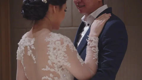 Fiancee Placing Her Hand on Groom to Be Shoulder Stock Footage 334019259