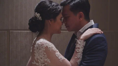 Fiancee Touching Groom to Be Shoulder in Intimate Moment Stock Footage 334019702