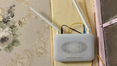 Fiber Broadband WiFi Router Installed Inside Home With Optical Cable Stock Footage 339475938