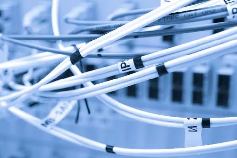 Fiber cables connected to servers Stock Photos