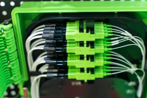 Fiber optic cable connect to communication Distribution point Stock Photos