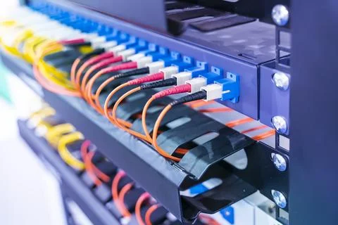 Fiber optic cable connect to communication Distribution point Stock Photos