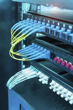 Fiber optic cable connect to communication Distribution point in datacenter Stock Photos