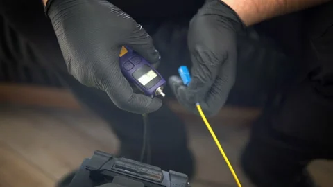 Fiber optic cable operator check connection speed Stock-Footage 138818503