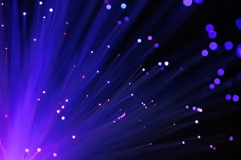 Fiber Optic Cables and Light for High-Speed Internet and Data Transmission .. Stock Photos