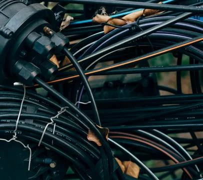 Fiber Optic Cables Connected to Network Equipment in Data Center Foto stock