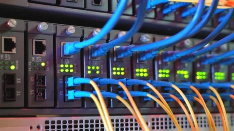Fiber Optic cables connected to optic ports and UTP Stock Footage 136642991