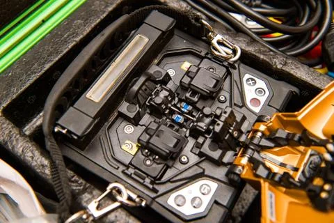 Fiber optic installation at home with e active clad-alignment splicer Stock Photos