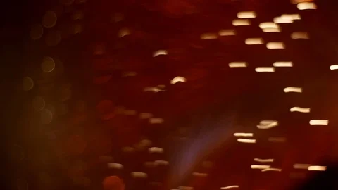 Fiber optic lamp spinning rapidly in dark and shimmers in different colors Stock Footage 71673248