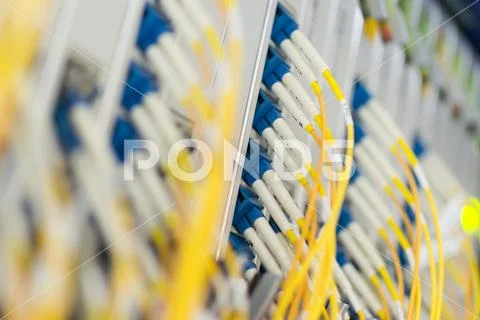 Fiber optic with servers in a technology data center Stock Photos