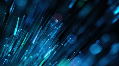 Fiber optic strands glowing brightly in vivid blue and green diagonal lines. Stock Footage 342764409