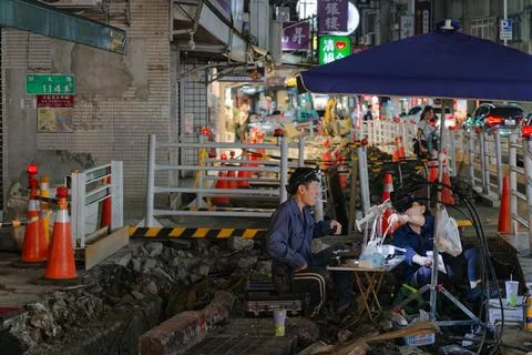 Fiber Optic Workers at Night Sidewalk Construction Taipei Shida District Photos