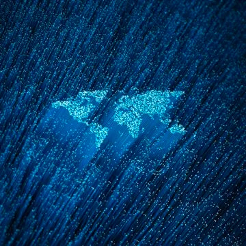 Fiber-optic world map concept Illustrazione stock