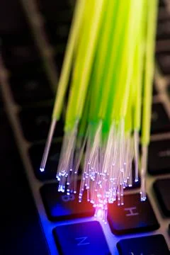 Fiber optical on computer keyboard background Stock Photos