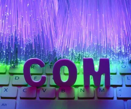 Fiber optics background with com Stockfoto's