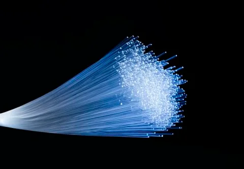 Fiber optics network cable for ultra fast internet communications, thin light Stock Photos