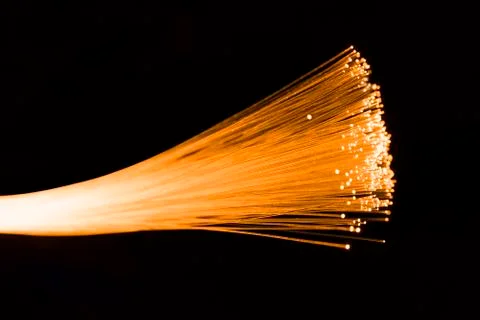 Fiber optics network cable for ultra fast internet communications, thin light Stock Photos