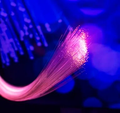 Fiber optics network cable for ultra fast internet communications, thin light Stock Photos