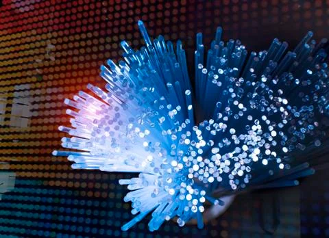 Fiber optics network cable for ultra fast internet communications, thin light Stock Photos