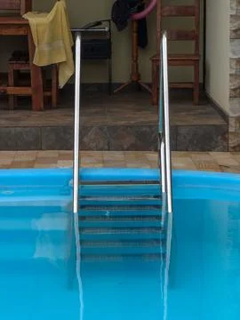 Fiber pool ladder for the elderly and obese 4 Stock Photos