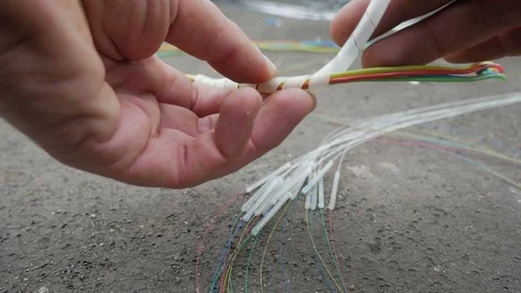 Fiber Splicing Tool Machine in use for connecting fiber optic cable Stock Footage 126948582