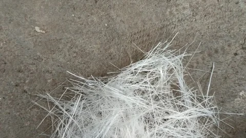 Fiberglass stack on a gray background Stock Footage 322879649