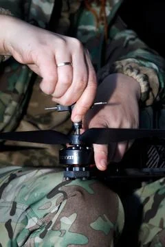 Fibre-optic FPV drones. Production and testing Stock Photos