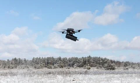 Fibre-optic FPV drones. Production and testing Stock Photos