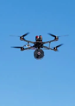 Fibre-optic FPV drones. Production and testing Stock Photos