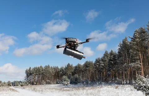 Fibre-optic FPV drones. Production and testing Stock Photos