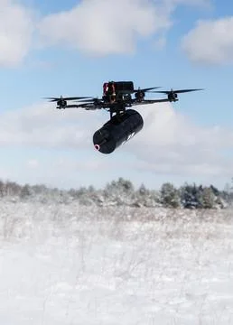 Fibre-optic FPV drones. Production and testing Stock Photos