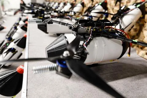 Fibre-optic FPV drones. Production and testing Stock Photos