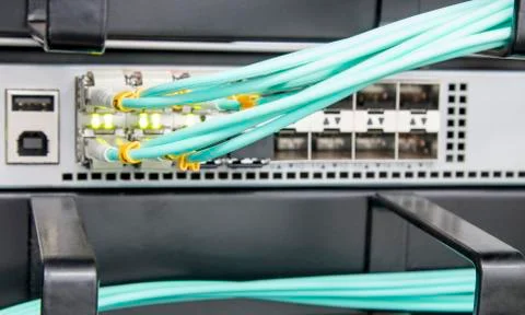 Fibre Optic Patch Leads in Networking Router 写真素材