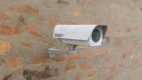 Fictitious branded surveillance camera on an old brick wall Illustrazione stock