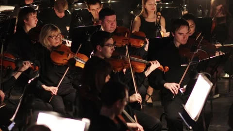 Fiddlers in the orchestra at Passenger Video stock 299649723