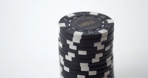 Fiddling with stack of black poker chips Stock Footage 112329556