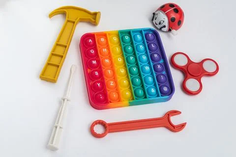 Fidget pop it toy rainbow color - antistress, fun and educational - With so.. Stock Photos