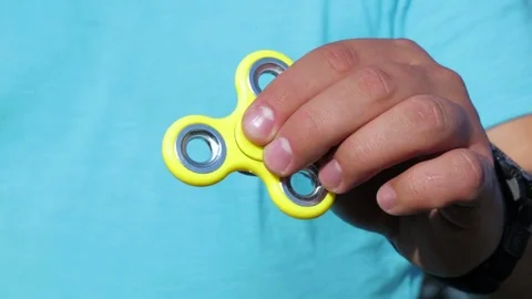 Fidget spinner rotation, Hand spinner Stock Footage 76984283