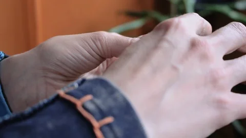 Fidget spinner spinning in hand Stock Footage 107572547