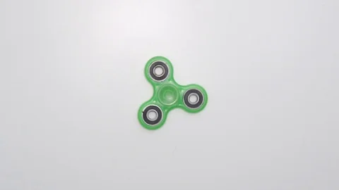 Fidget Spinner Spinning Overhead Stock Footage 100645682