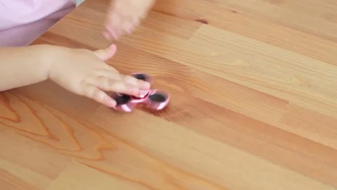Fidget spinner on table Video stock 77213638
