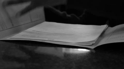 Fidgeting with paper filing Stock Footage 51491858