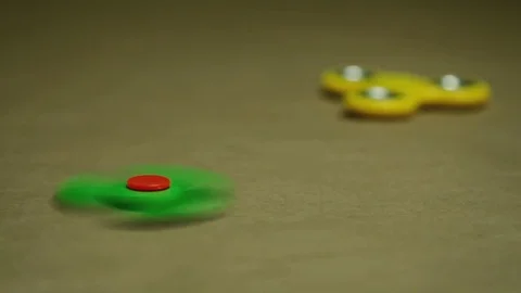 Fidgeting spinner rotation, Hand spinner Stock Footage 76947248