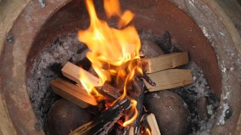 Fie burns in a fire pit in slow motion Stock Footage 115055220