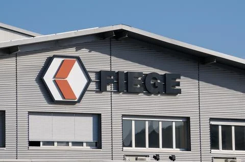 Fiege Logistics company logo sign on warehouse building facade in Balerna, S.. Stock Photos