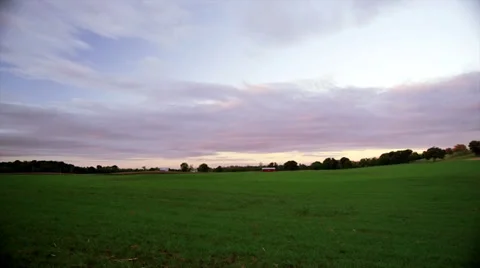 Field and barn left to right pan - extreme WS Stock-Footage 32076800