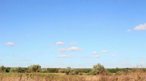 Field and clouds Stock Footage 8679833